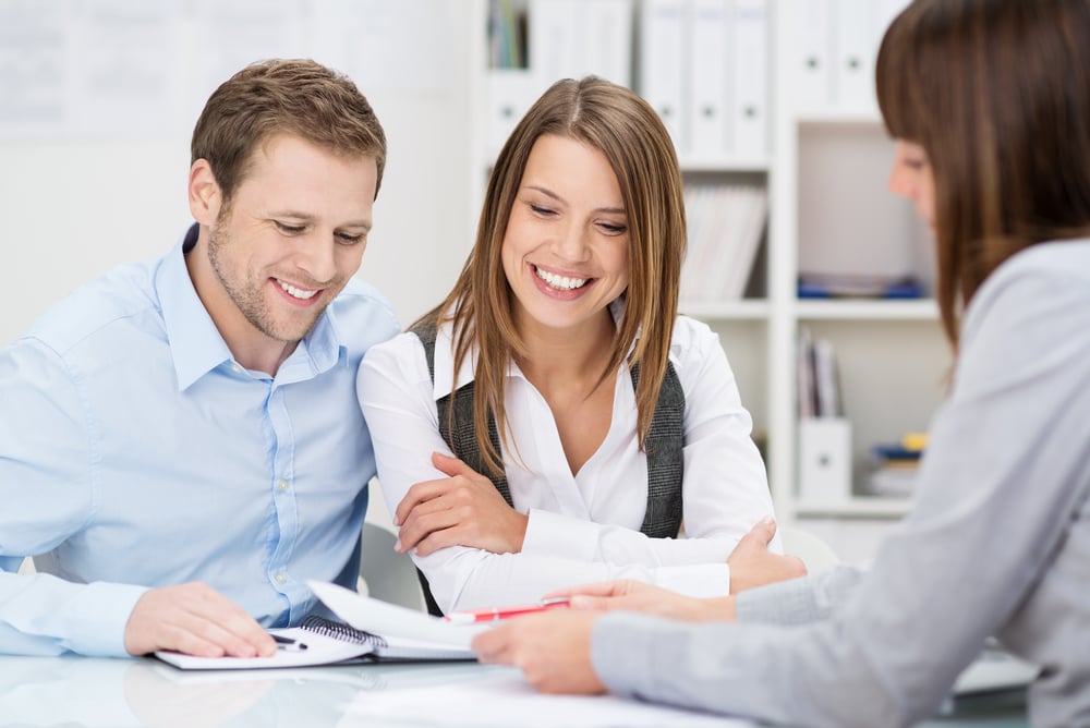  adviser giving a presentation to a dentist and staff